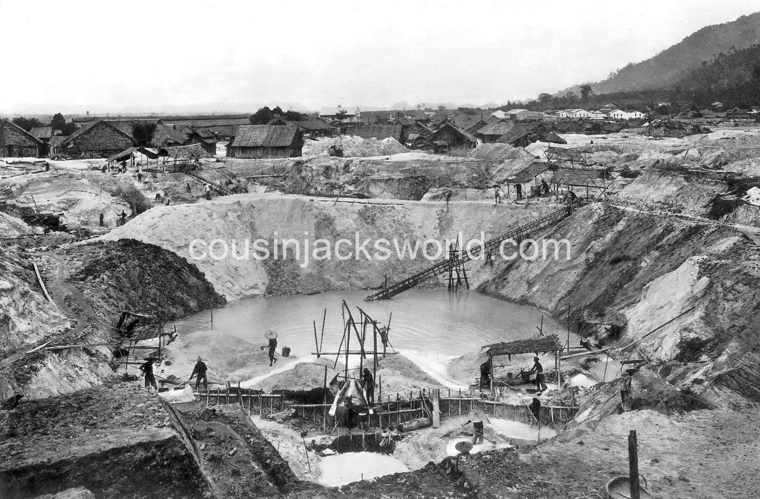 Opencast tin mine, Ipoh, Malaya. The demise of Cornish mining migration