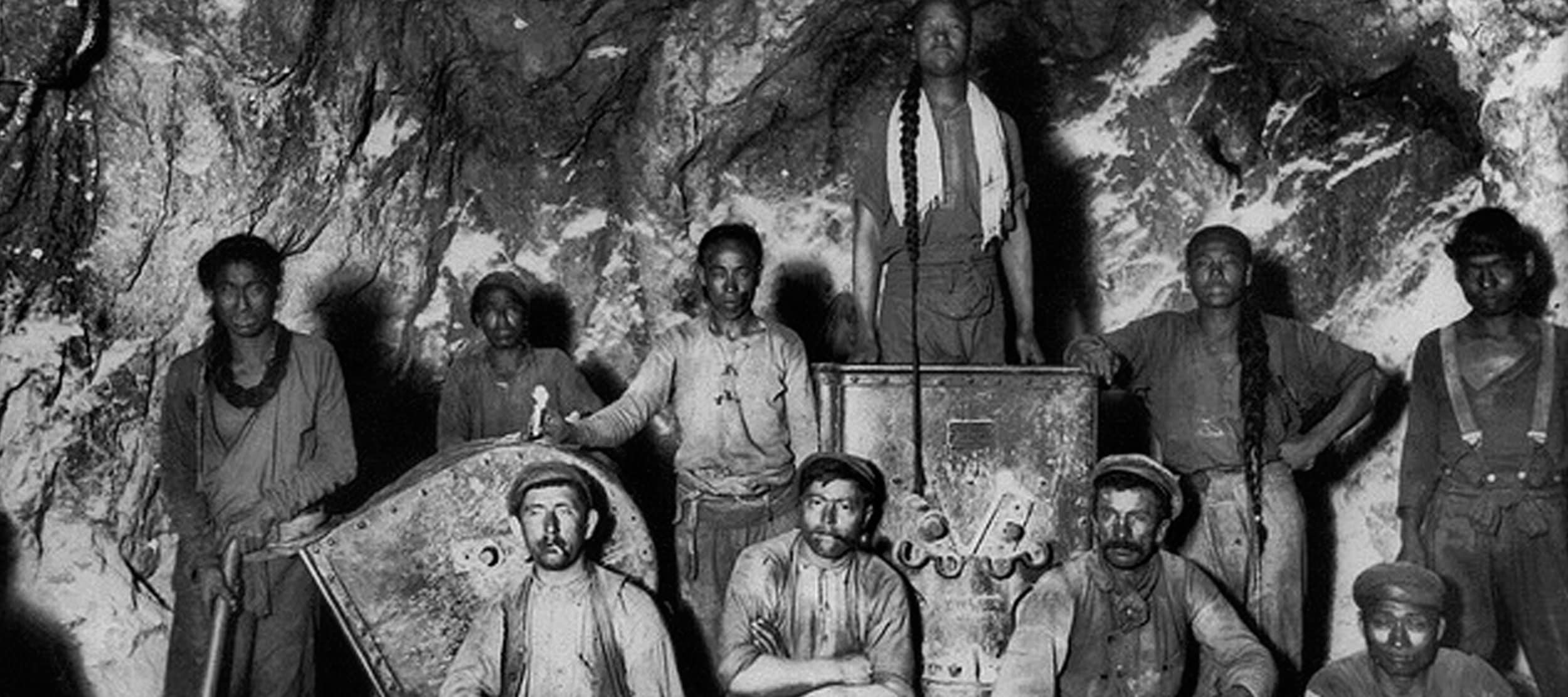 Chinese and White laborers in a gold mine in South Africa, probably Cornish miners