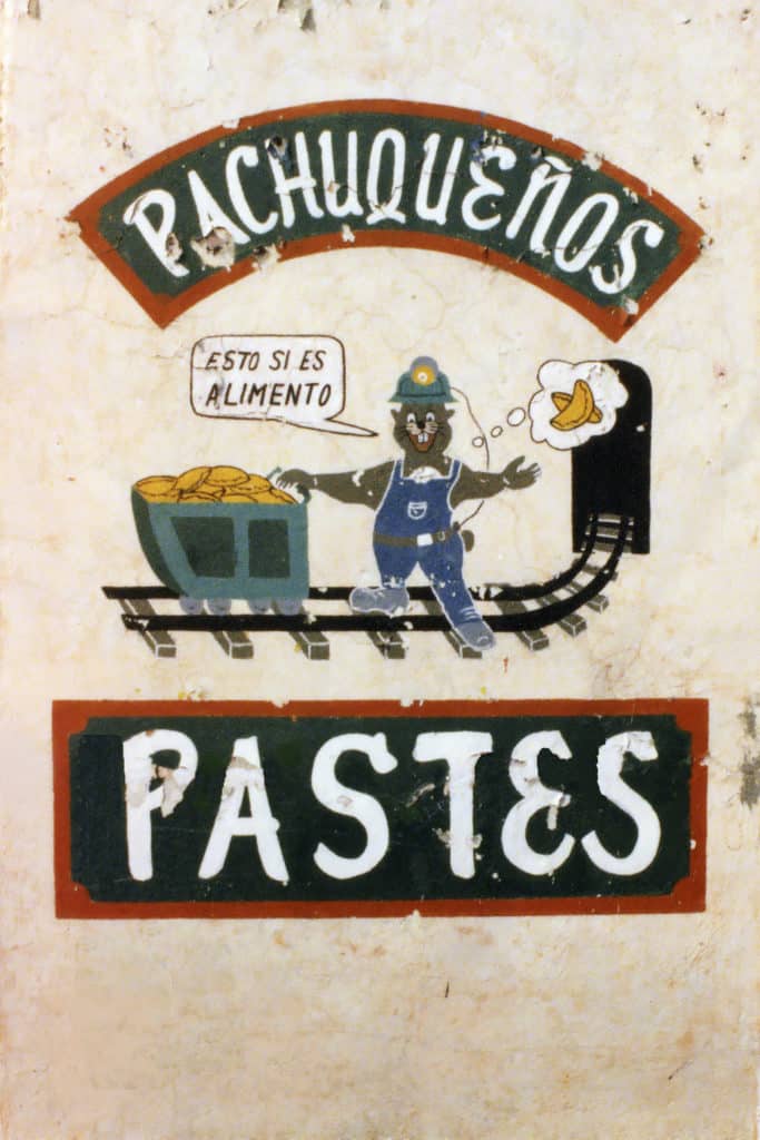 A paste sign in Pachuca, Mexico, melding Cornish and Mexican symbolism: the pasty and a tuzo dressed as a miner  who is saying, 'this is food'. The pasty industry in Hidalgo is a multi million peso success story.