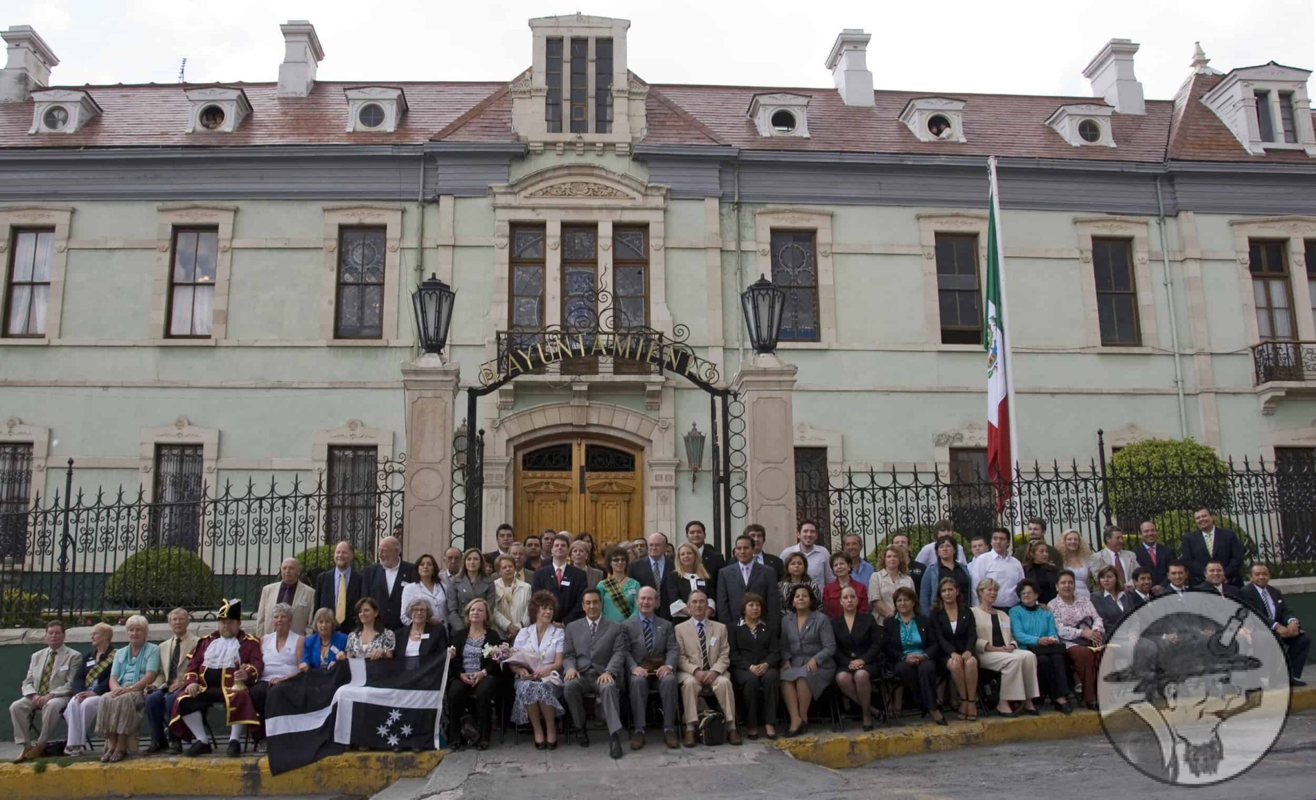 Group photo outside Francis Rule’s former residence, Casa Rule, now Pachuca's City Hall
