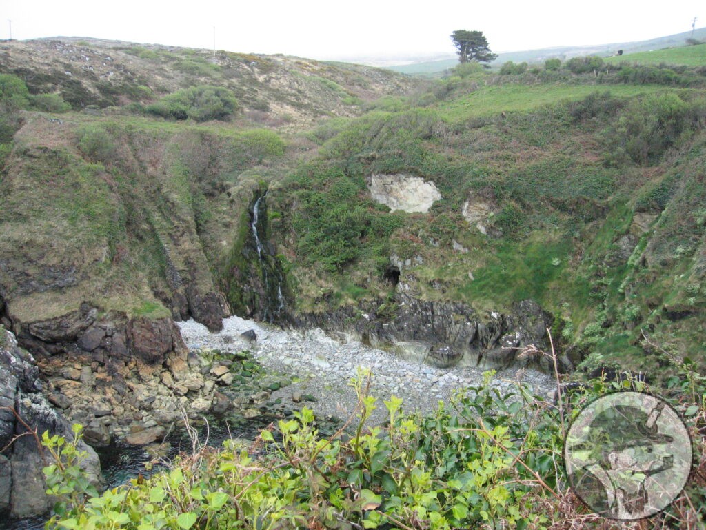 Derelict miners' cottages on the platform top left